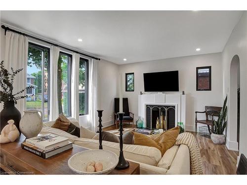 28 West Avenue, Kitchener, ON - Indoor Photo Showing Living Room With Fireplace