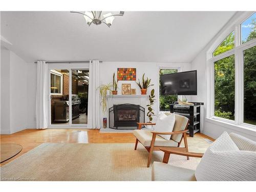 97 Century Hill Drive, Kitchener, ON - Indoor Photo Showing Living Room With Fireplace