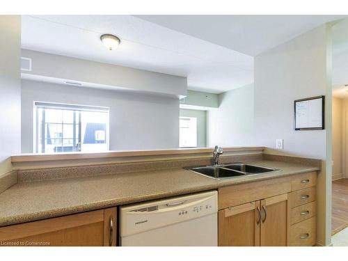 439-200 Mccarthy Road, Stratford, ON - Indoor Photo Showing Kitchen With Double Sink