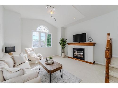 252 Holbeach Court, Waterloo, ON - Indoor Photo Showing Living Room With Fireplace