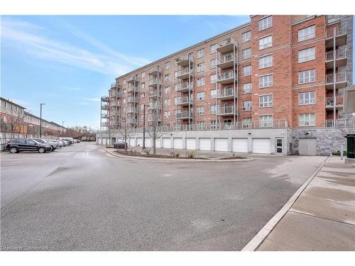 406-155 Water Street S, Cambridge, ON - Outdoor With Balcony With Facade