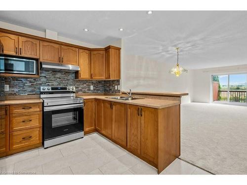 12 Clonmel Lane, Port Dover, ON - Indoor Photo Showing Kitchen With Double Sink