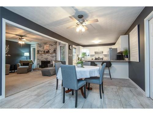 26 Azores Crescent, Cambridge, ON - Indoor Photo Showing Dining Room With Fireplace