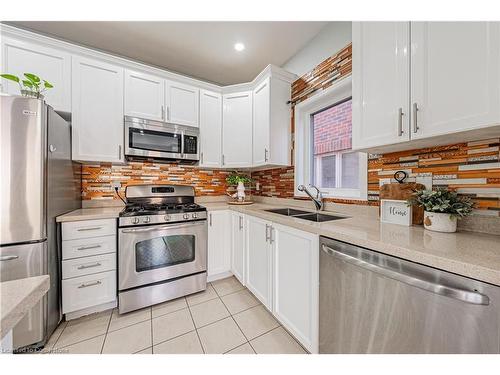 4264 Vivaldi Road E, Burlington, ON - Indoor Photo Showing Kitchen With Double Sink