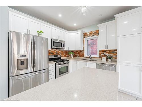 4264 Vivaldi Road E, Burlington, ON - Indoor Photo Showing Kitchen With Double Sink With Upgraded Kitchen