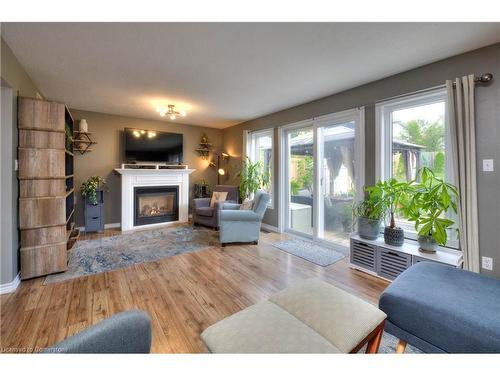 258 Keewatin Avenue, Kitchener, ON - Indoor Photo Showing Living Room With Fireplace