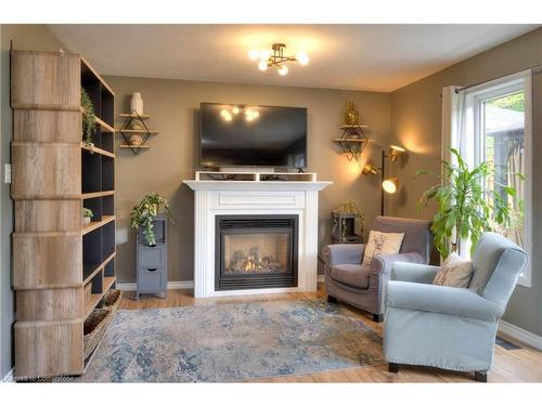 258 Keewatin Avenue, Kitchener, ON - Indoor Photo Showing Living Room With Fireplace