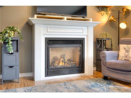 258 Keewatin Avenue, Kitchener, ON - Indoor Photo Showing Living Room With Fireplace