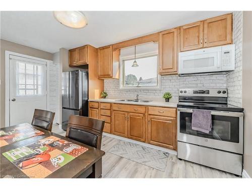 24 Clarke Street, Woodstock, ON - Indoor Photo Showing Kitchen With Double Sink