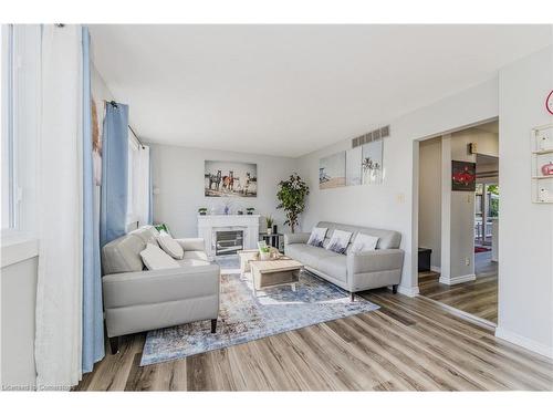 92 Charles Best Place, Kitchener, ON - Indoor Photo Showing Living Room With Fireplace