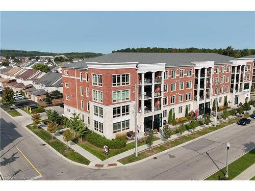 202-175 Commonwealth Street, Kitchener, ON - Outdoor With Facade