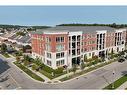 202-175 Commonwealth Street, Kitchener, ON  - Outdoor With Facade 