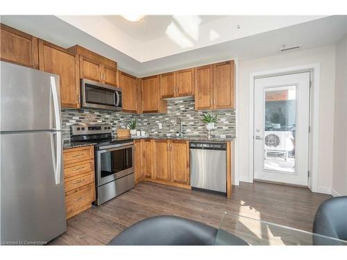 202-175 Commonwealth Street, Kitchener, ON - Indoor Photo Showing Kitchen With Double Sink