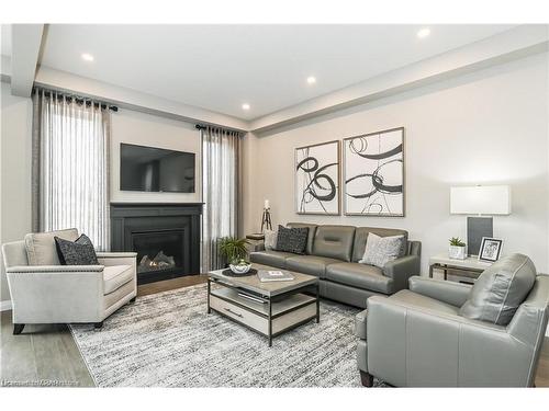 437 Westhaven Street, Waterloo, ON - Indoor Photo Showing Living Room With Fireplace