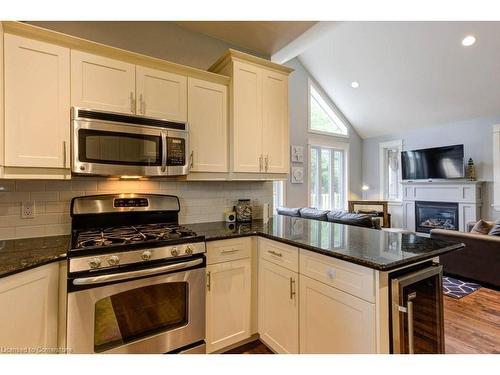 71288 Elm Street, Bluewater, ON - Indoor Photo Showing Kitchen With Fireplace