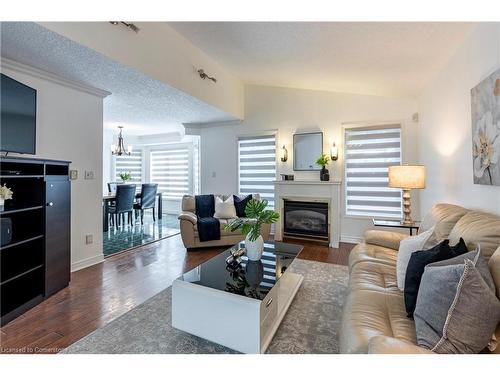 94 Queen Charlotte Crescent, Kitchener, ON - Indoor Photo Showing Living Room With Fireplace