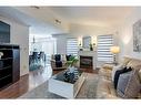 94 Queen Charlotte Crescent, Kitchener, ON  - Indoor Photo Showing Living Room With Fireplace 