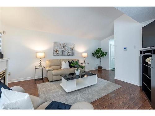 94 Queen Charlotte Crescent, Kitchener, ON - Indoor Photo Showing Living Room With Fireplace