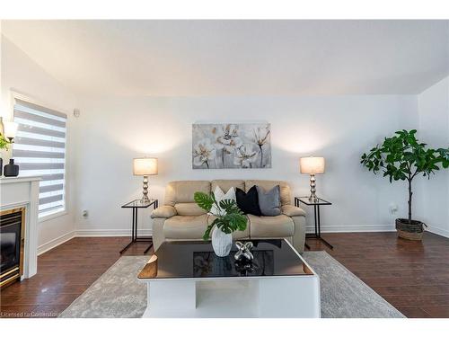 94 Queen Charlotte Crescent, Kitchener, ON - Indoor Photo Showing Living Room With Fireplace