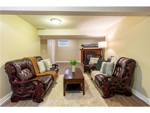 94 Queen Charlotte Crescent, Kitchener, ON - Indoor Photo Showing Living Room With Fireplace