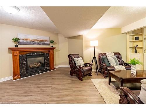 94 Queen Charlotte Crescent, Kitchener, ON - Indoor Photo Showing Living Room With Fireplace