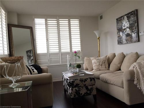 803-2379 Central Park Drive, Oakville, ON - Indoor Photo Showing Living Room