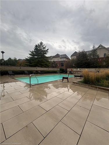 803-2379 Central Park Drive, Oakville, ON - Outdoor With In Ground Pool