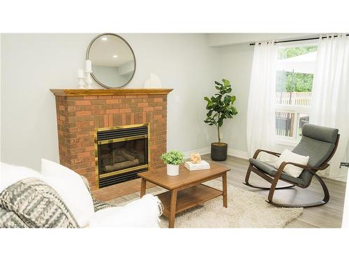 413 Lansdowne Avenue, Woodstock, ON - Indoor Photo Showing Living Room With Fireplace