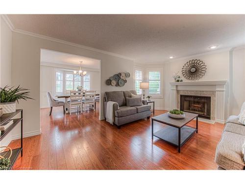 2-410 Craigleith Drive, Waterloo, ON - Indoor Photo Showing Living Room With Fireplace