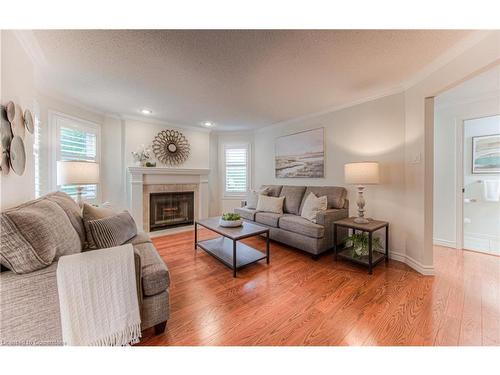 2-410 Craigleith Drive, Waterloo, ON - Indoor Photo Showing Living Room With Fireplace