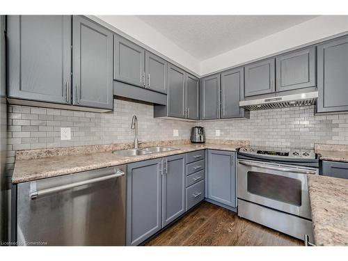 M62-175 David Bergey Drive, Kitchener, ON - Indoor Photo Showing Kitchen With Double Sink With Upgraded Kitchen