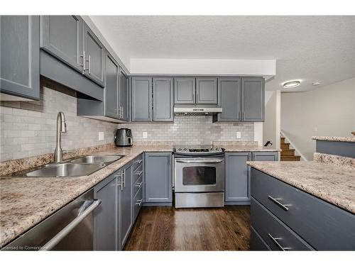 M62-175 David Bergey Drive, Kitchener, ON - Indoor Photo Showing Kitchen With Double Sink With Upgraded Kitchen