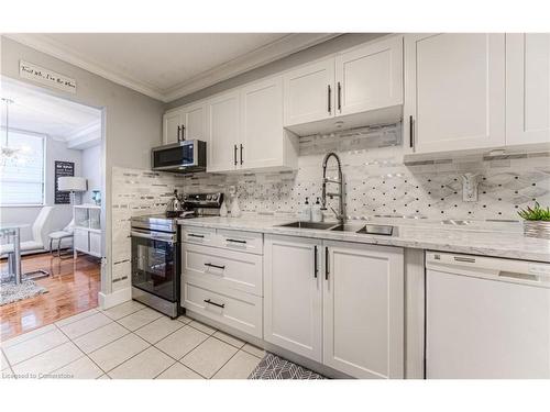 801-65 Westmount Street N, Waterloo, ON - Indoor Photo Showing Kitchen With Double Sink With Upgraded Kitchen