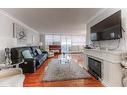 801-65 Westmount Street N, Waterloo, ON  - Indoor Photo Showing Living Room With Fireplace 