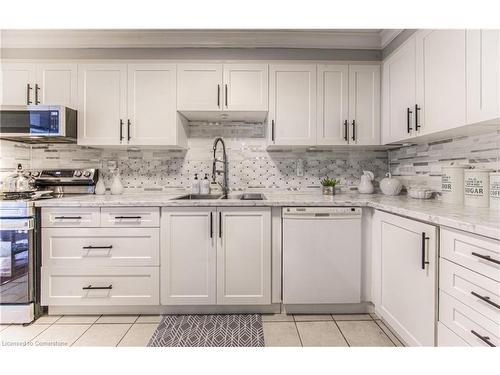 801-65 Westmount Street N, Waterloo, ON - Indoor Photo Showing Kitchen With Double Sink With Upgraded Kitchen