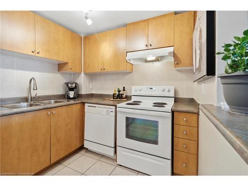 405-6720 Glen Erin Drive, Mississauga, ON - Indoor Photo Showing Kitchen With Double Sink