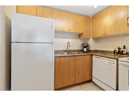 405-6720 Glen Erin Drive, Mississauga, ON - Indoor Photo Showing Kitchen With Double Sink