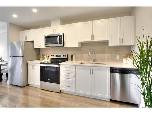 211-5 Wake Robin Drive, Kitchener, ON - Indoor Photo Showing Kitchen With Stainless Steel Kitchen With Double Sink