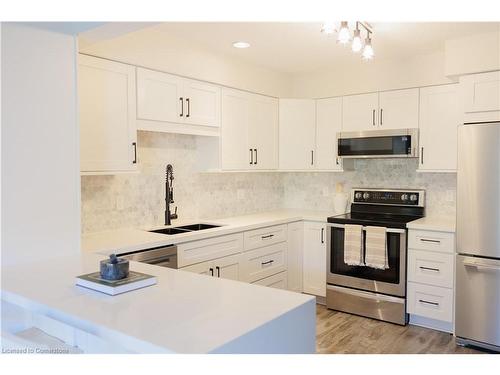 45 Ralston Drive, Guelph, ON - Indoor Photo Showing Kitchen With Stainless Steel Kitchen With Double Sink With Upgraded Kitchen