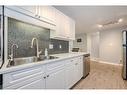 54-63 Conroy Crescent, Guelph, ON  - Indoor Photo Showing Kitchen With Double Sink 