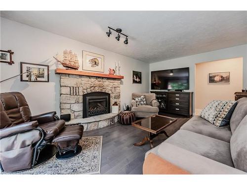 12 Jo Anne Crescent, Centre Wellington, ON - Indoor Photo Showing Living Room With Fireplace