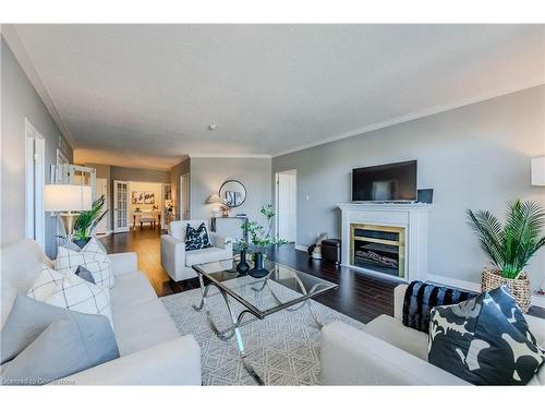 507-255 Keats Way, Waterloo, ON - Indoor Photo Showing Living Room With Fireplace