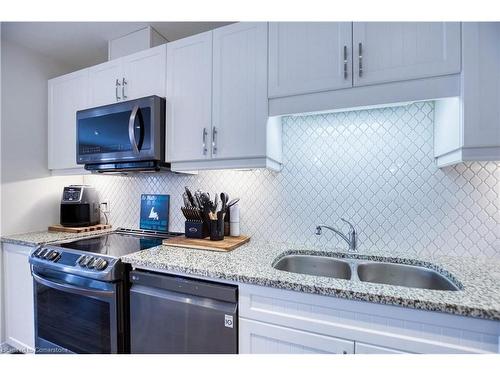 41-111 South Creek Drive, Kitchener, ON - Indoor Photo Showing Kitchen With Double Sink