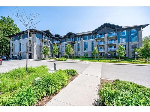 413-50 Bryan Court, Kitchener, ON - Outdoor With Balcony With Facade