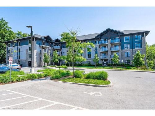 413-50 Bryan Court, Kitchener, ON - Outdoor With Balcony With Facade