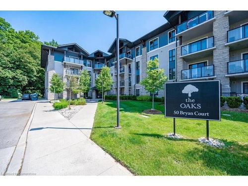 413-50 Bryan Court, Kitchener, ON - Outdoor With Balcony With Facade