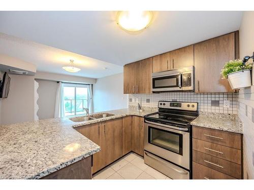 413-50 Bryan Court, Kitchener, ON - Indoor Photo Showing Kitchen With Double Sink