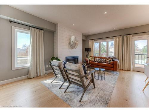 14 Kissing Bridge Drive, Elmira, ON - Indoor Photo Showing Living Room With Fireplace