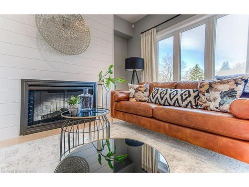 14 Kissing Bridge Drive, Elmira, ON - Indoor Photo Showing Living Room With Fireplace