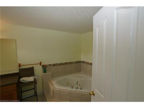 10 Doll Court, Kitchener, ON - Indoor Photo Showing Bathroom